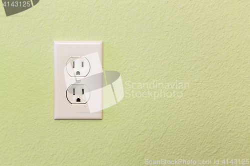 Image of Electrical Sockets In Colorful Wall