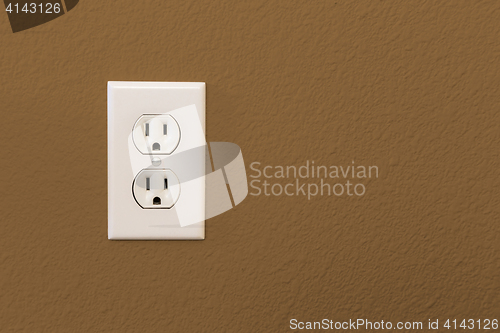 Image of Electrical Sockets In Colorful Brown Wall