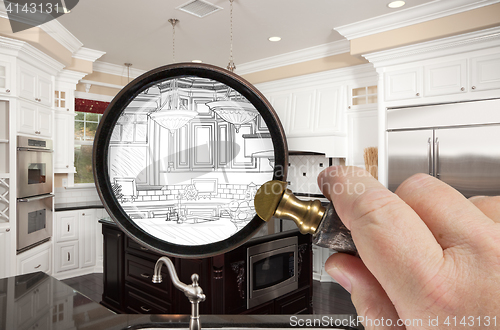 Image of Hand Holding Magnifying Glass Revealing Custom Kitchen Design Dr