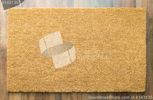Image of Blank Home Sweet Home Welcome Mat On Wood Floor