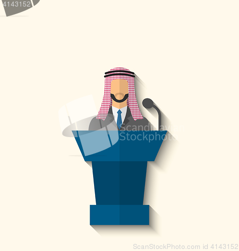 Image of Arabic Businessman Orator in Keffiyeh Speaking From Rostrum