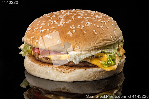 Image of Hamburger On A Black Glass