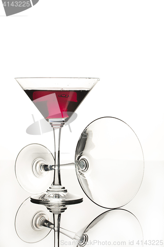 Image of Wineglasses On A Black Glass Studio Background