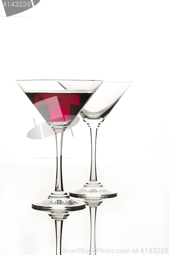 Image of Wineglasses On A Black Glass Studio Background