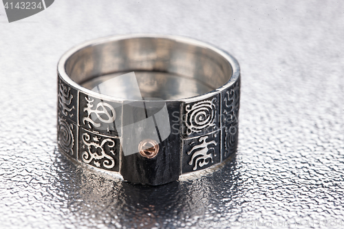 Image of Handmade jewelry on a black glass