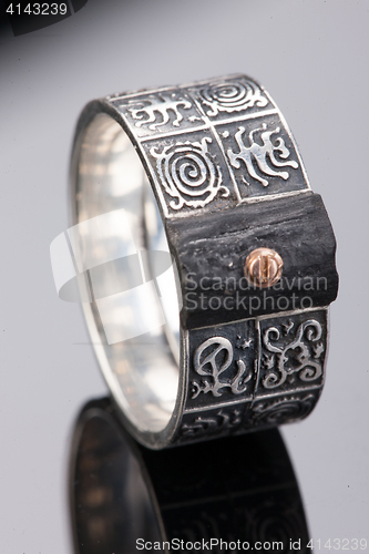 Image of Handmade jewelry on a black glass