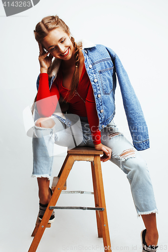 Image of young pretty stylish blond hipster girl posing emotional isolated on white background happy smiling cool smile, lifestyle people concept