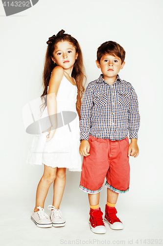 Image of little cute boy and girl hugging playing on white background, ha