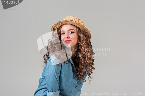 Image of The girl in straw hat