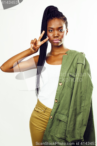 Image of young pretty african-american girl posing cheerful emotional on white background isolated, lifestyle people concept