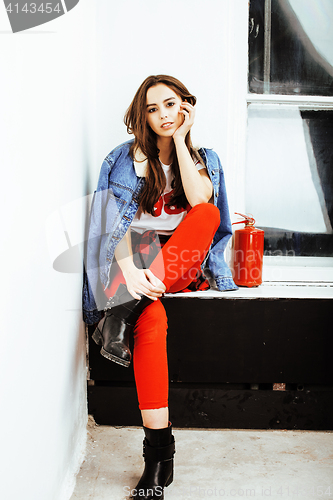 Image of young pretty stylish hipster girl posing emotional isolated on white background happy smiling cool smile, lifestyle people concept