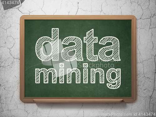 Image of Data concept: Data Mining on chalkboard background