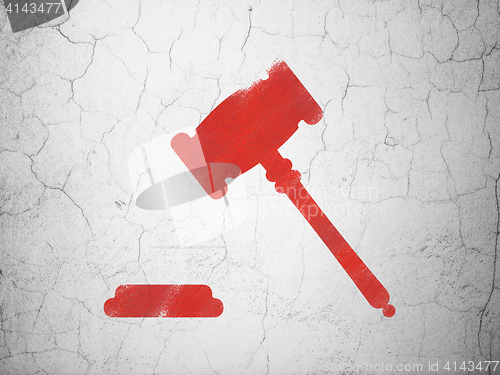 Image of Law concept: Gavel on wall background