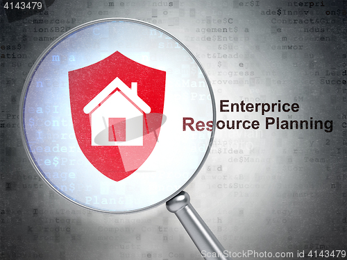 Image of Finance concept: Shield and Enterprice Resource Planning with optical glass