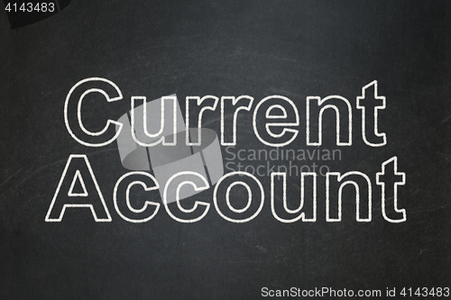 Image of Currency concept: Current Account on chalkboard background