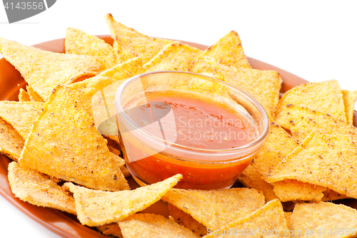 Image of Plate of freshly made spicy nachos with salsa