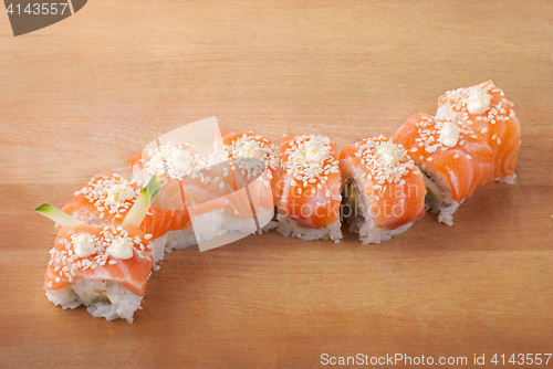 Image of Closeup japanese sushi on wooden plate