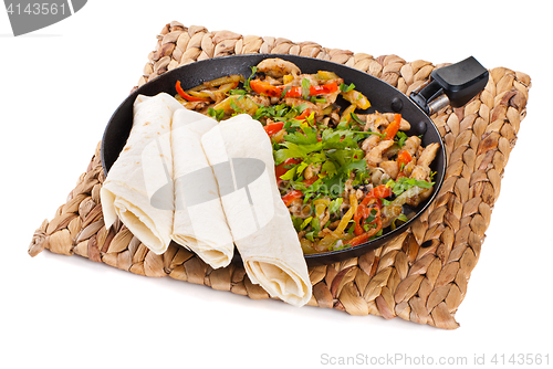 Image of traditional mexican beef fajitas with tortillas