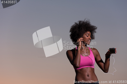 Image of young african american woman in nature