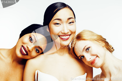 Image of three different nation woman: asian, african-american, caucasian together isolated on white background happy smiling, diverse type on skin, lifestyle people concept