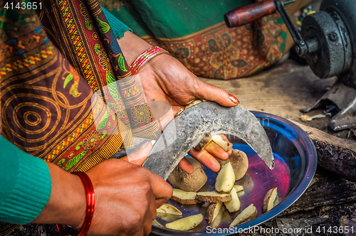 Image of Woman with knife