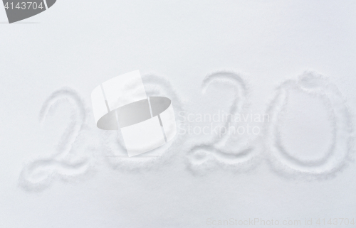 Image of new year 2020 number or date on snow surface