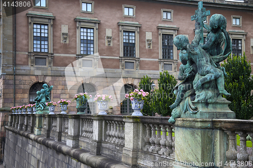 Image of  bronze sculpture Religion at the Royal palace statue, Stockholm