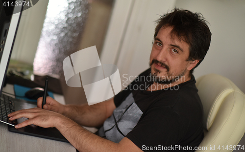 Image of graphic designer in the office