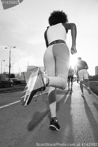 Image of multiethnic group of people on the jogging