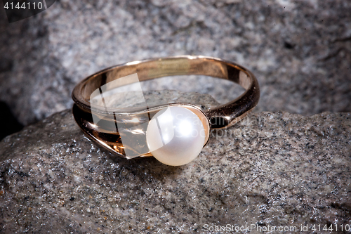Image of Ring On A Stone Background