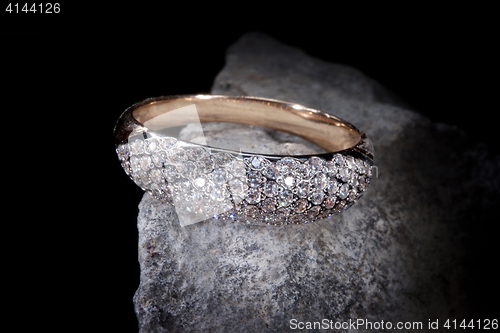 Image of Ring And Stone On Black