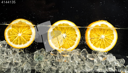 Image of Oranges, Water And Ice