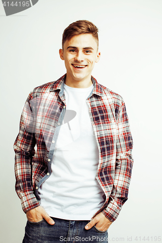 Image of young handsome teenage hipster guy posing emotional, happy smiling against white background isolated, lifestyle people concept