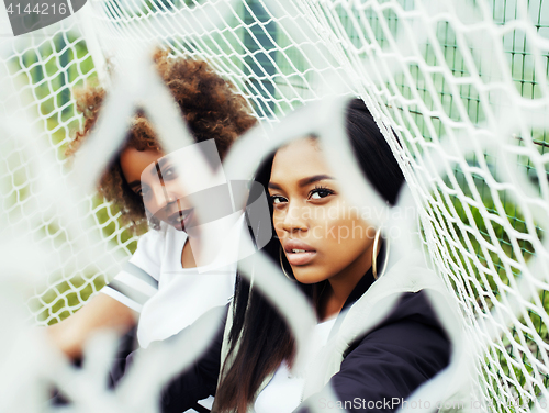 Image of young pretty multi ethnicity afro-american girls having fun on f