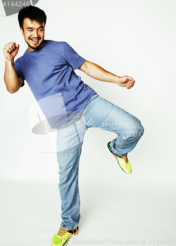 Image of young cute asian man on white background gesturing emotional, po