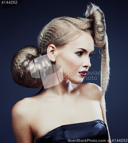 Image of young elegant woman with creative hair style leopard print close