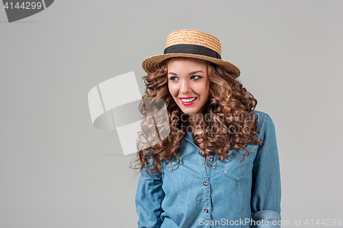 Image of The girl in straw hat