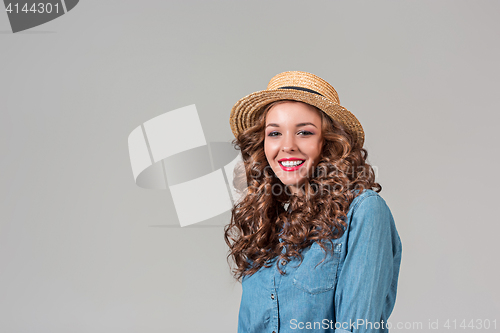 Image of The girl in straw hat