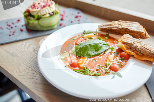Image of plate of delicious gazpacho soup at restaurant