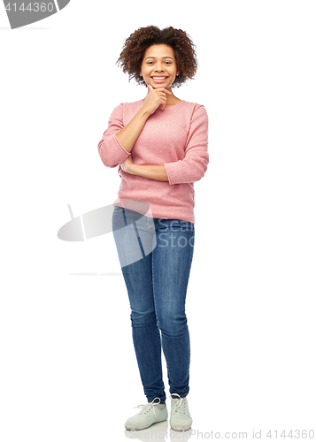 Image of happy african american young woman over white