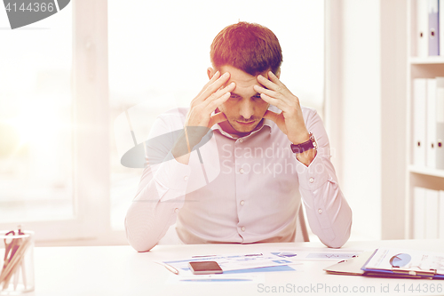 Image of close up of businessman with smartphone