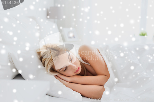 Image of young woman sleeping in bed at home bedroom