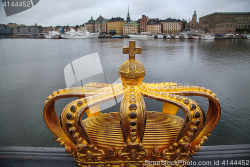 Image of Skeppsholmsbron (Skeppsholm Bridge) with Golden Crown on a bridg