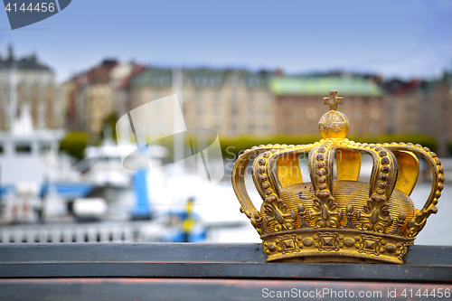 Image of Skeppsholmsbron (Skeppsholm Bridge) with Golden Crown on a bridg