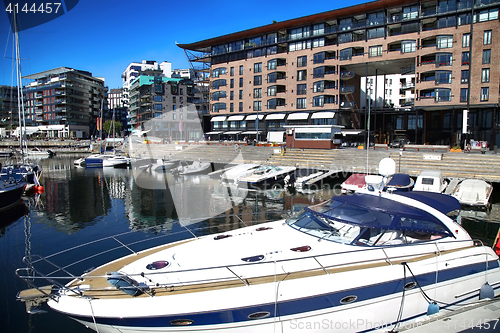 Image of Yacht and modern district on street Stranden, Aker Brygge in Osl