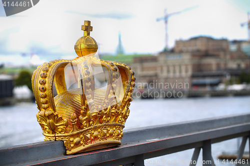 Image of Skeppsholmsbron (Skeppsholm Bridge) with Golden Crown on a bridg