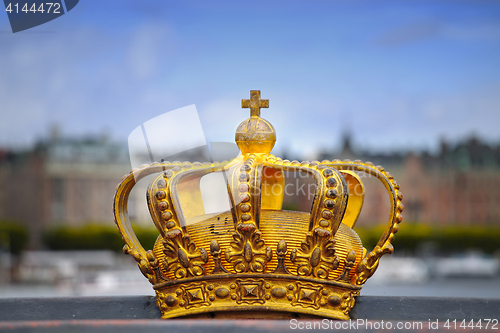 Image of Skeppsholmsbron (Skeppsholm Bridge) with Golden Crown on a bridg