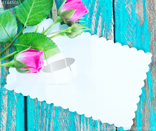 Image of flowers and sheet for note
