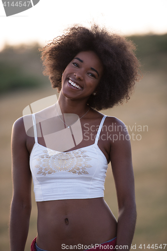 Image of young black woman in nature