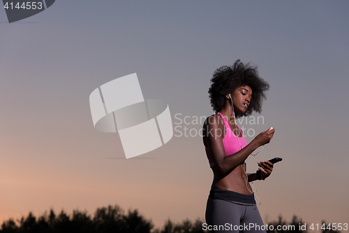 Image of young african american woman in nature